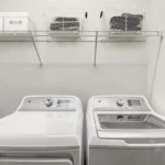 16-camden-carolinian-apartments-raleigh-nc-full-size-washer-dryer-side-by-side-with-shelving-above